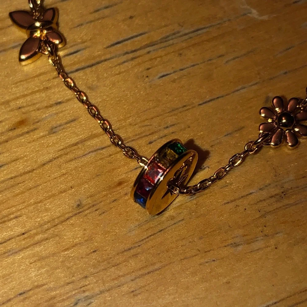 Kate Spade Gold Tone Rainbow Joy Charm Bracelet Heart, Flower, Clover NWT - Picture 3 of 12